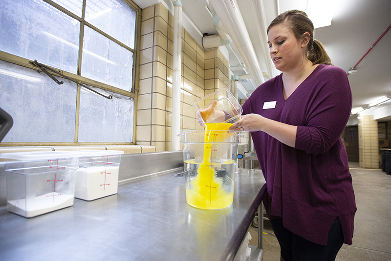 Emory Telios prepares the sorbet mixture.