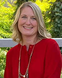 Blond woman in red blouse 