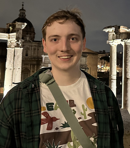 Male student at historic Rome site