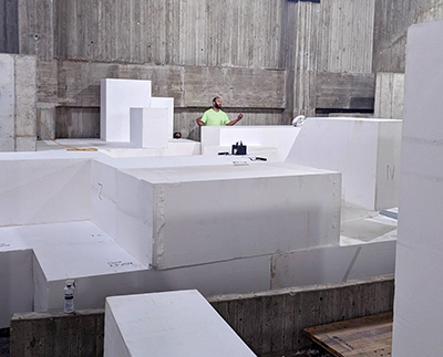 Large white foam cubes fill in former theater space