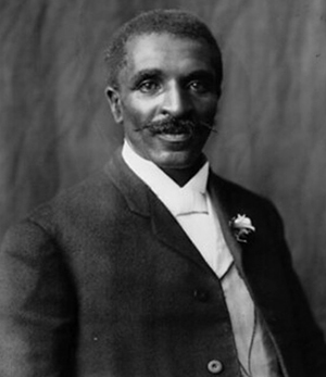 archival black and white photo of Black man in suit with lapel f